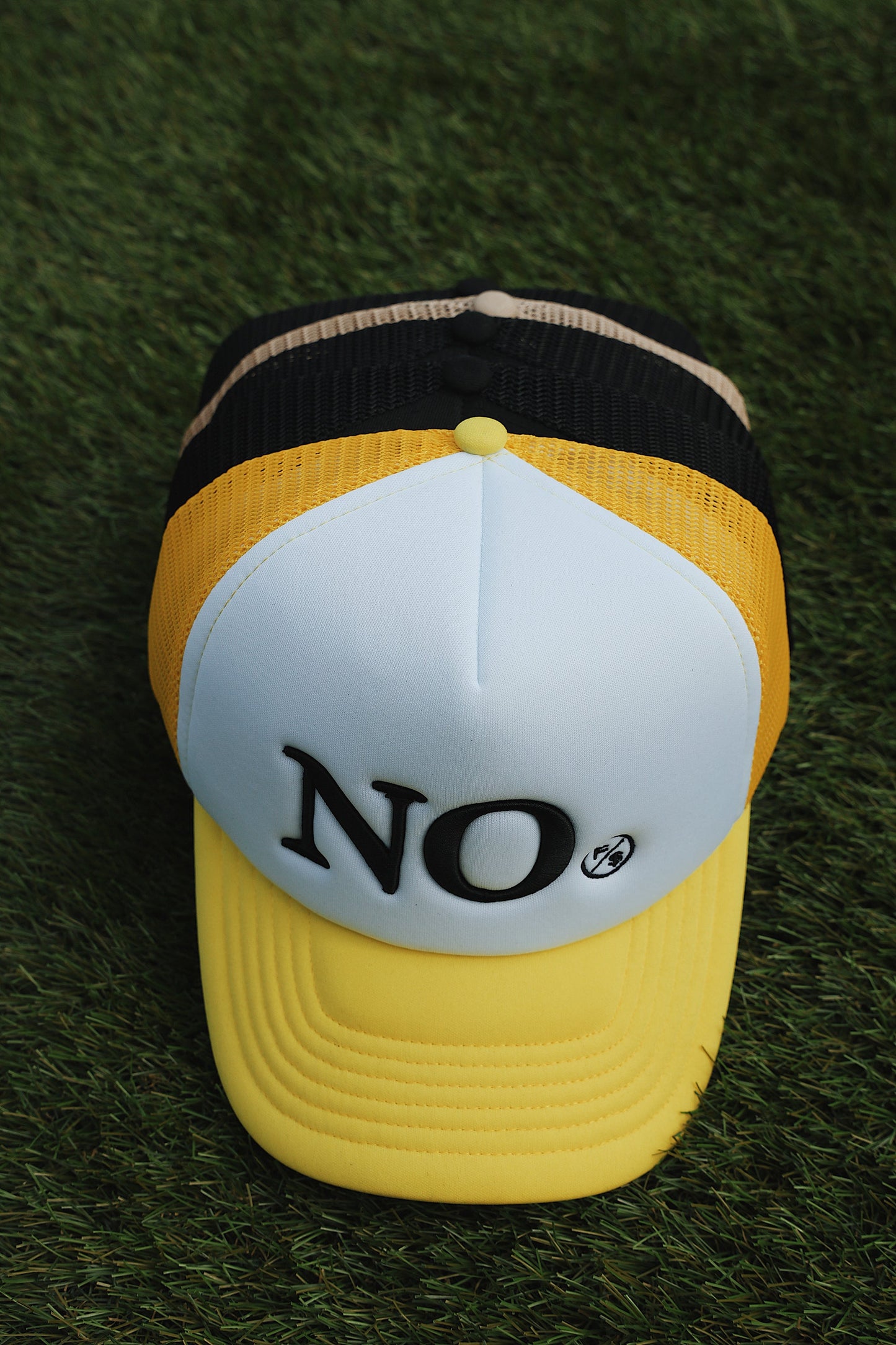 NO: Trucker Hat (Black or Yellow)