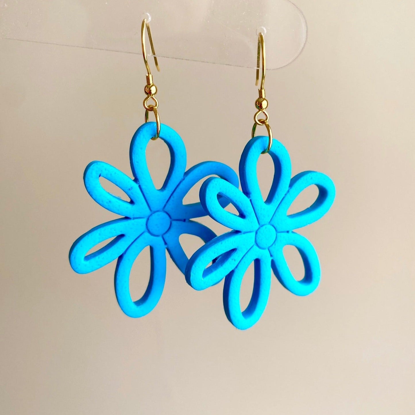 Turquoise blue colored flower daisy polymer clay dangle earrings