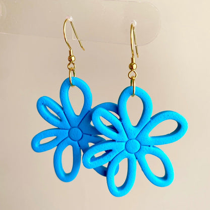 Turquoise blue colored flower daisy polymer clay dangle earrings