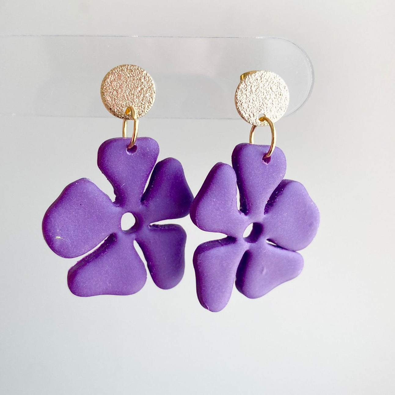 Eggplant purple hibiscus flower polymer clay dangle earrings