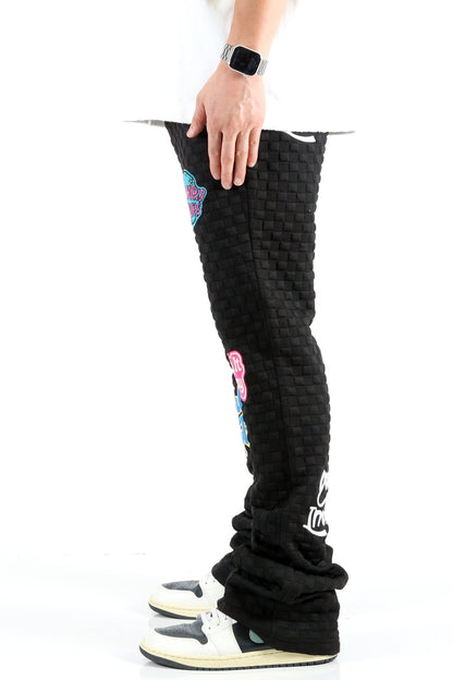 KUROI Waffle fleece graphic skinny flare stacked pants